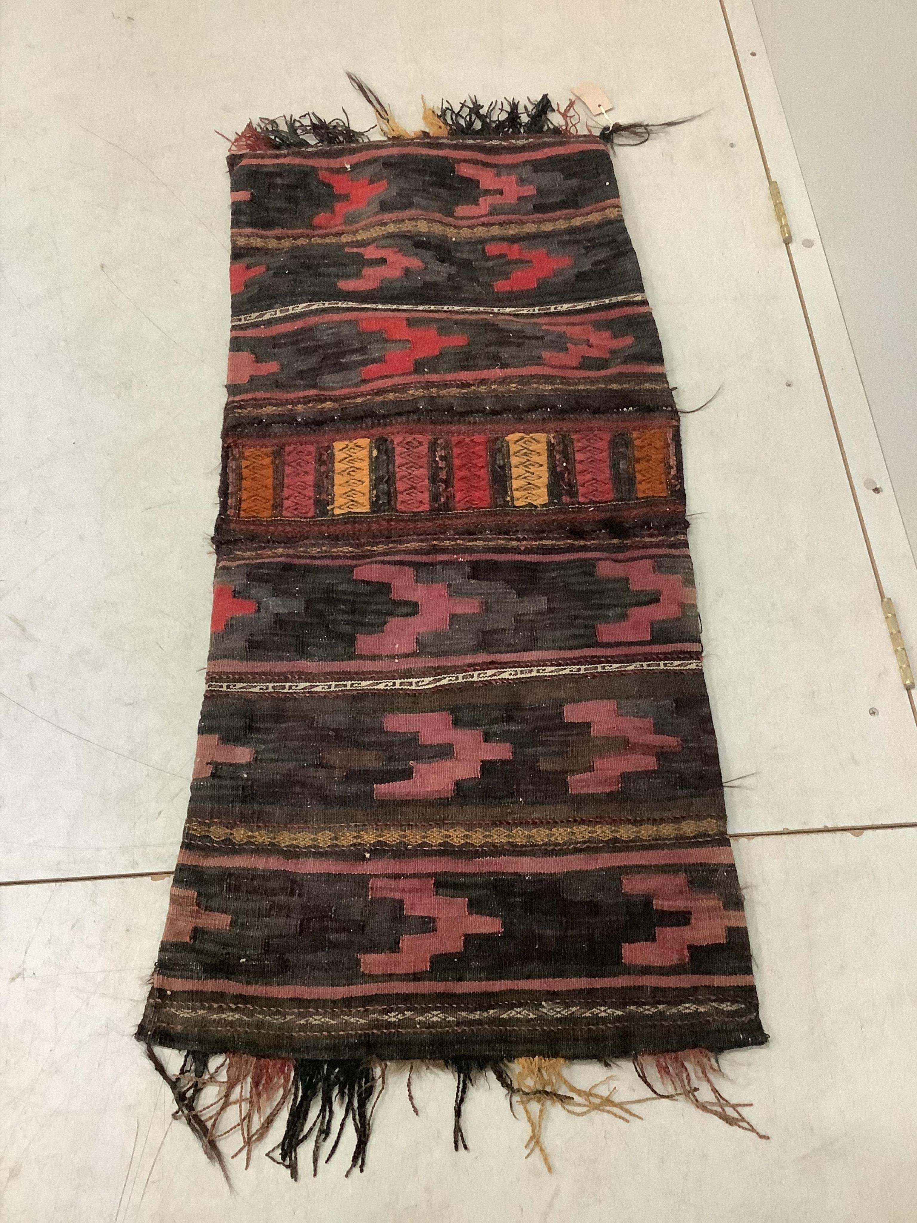 An Afghan flatweave salt bag, a double saddle bag and one other bag, largest approximately 120 x 80cm